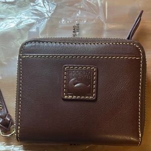 Brand new Dooney and Bourke Florentine zip around wallet